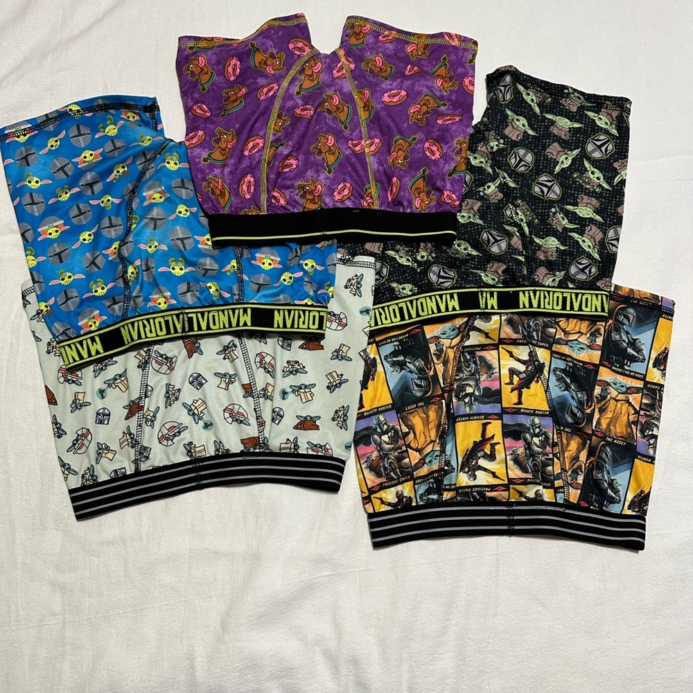 four Star Wars Boxers and one Scooby Doo